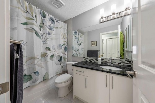 15 Woodmont Green Sw, Calgary, AB 
