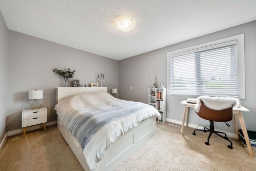 15 Woodmont Green Sw, Calgary, AB 