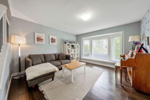 15 Woodmont Green Sw, Calgary, AB 