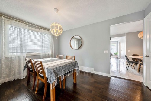 15 Woodmont Green Sw, Calgary, AB 