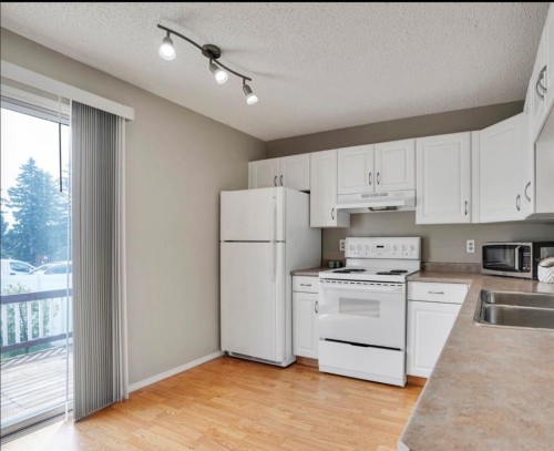 164 Woodsman Lane, Calgary, AB 