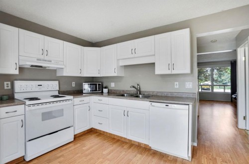 164 Woodsman Lane, Calgary, AB 