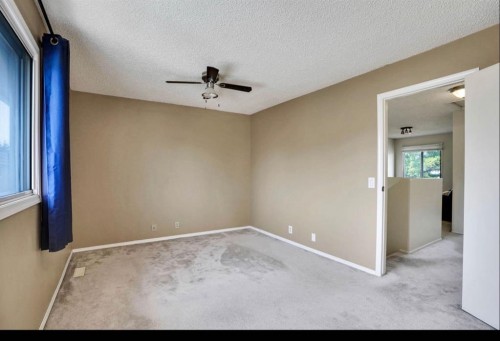 164 Woodsman Lane, Calgary, AB 