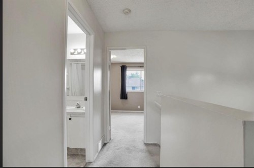 164 Woodsman Lane, Calgary, AB 