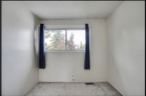 164 Woodsman Lane, Calgary, AB 