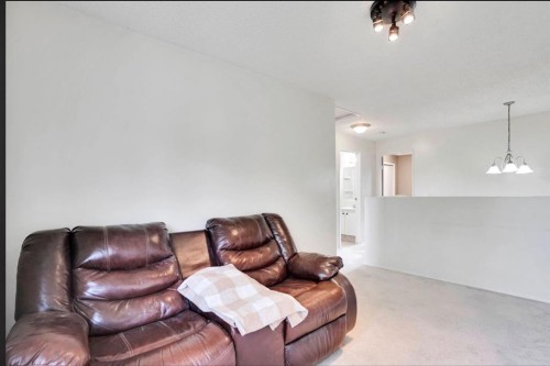 164 Woodsman Lane, Calgary, AB 
