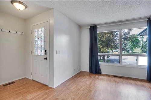164 Woodsman Lane, Calgary, AB 