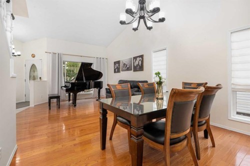 704 Woodside Drive Nw, Airdrie, AB - Indoor Photo Showing Dining Room