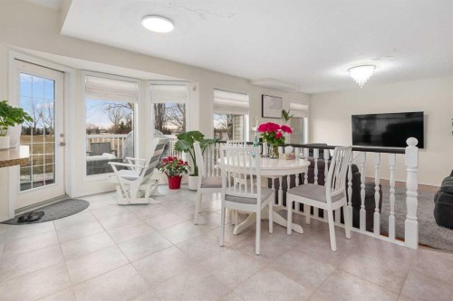 704 Woodside Drive Nw, Airdrie, AB - Indoor Photo Showing Dining Room