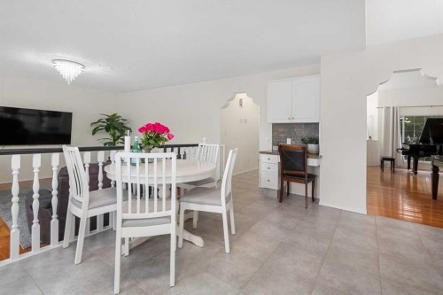 704 Woodside Drive Nw, Airdrie, AB - Indoor Photo Showing Dining Room