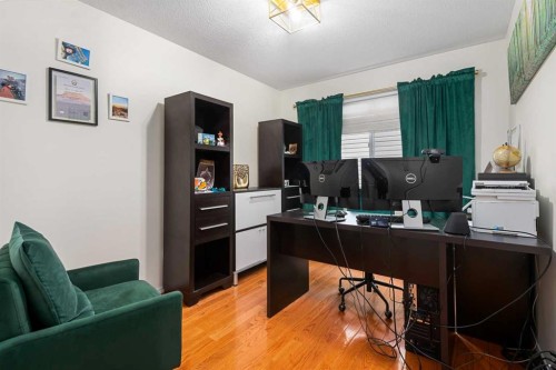 704 Woodside Drive Nw, Airdrie, AB - Indoor Photo Showing Other Room