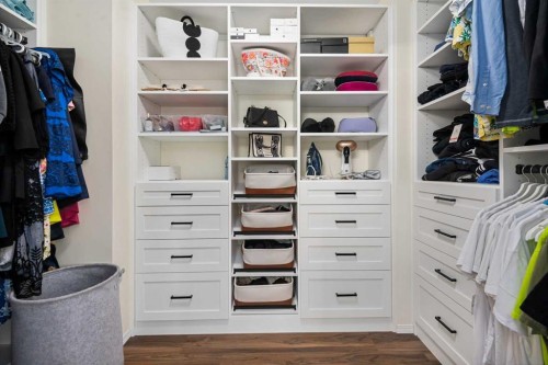704 Woodside Drive Nw, Airdrie, AB - Indoor With Storage