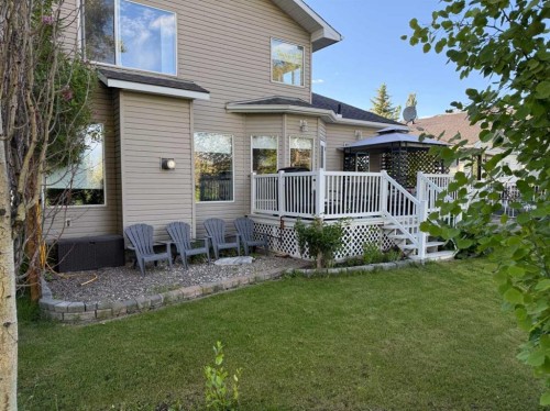 704 Woodside Drive Nw, Airdrie, AB - Outdoor With Deck Patio Veranda With Exterior