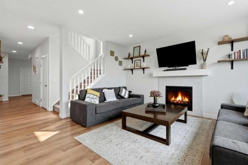 642 Cornerstone Avenue Ne, Calgary, AB - Indoor Photo Showing Living Room With Fireplace