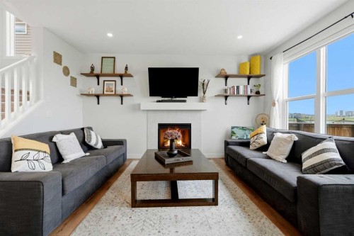 642 Cornerstone Avenue Ne, Calgary, AB - Indoor Photo Showing Living Room With Fireplace