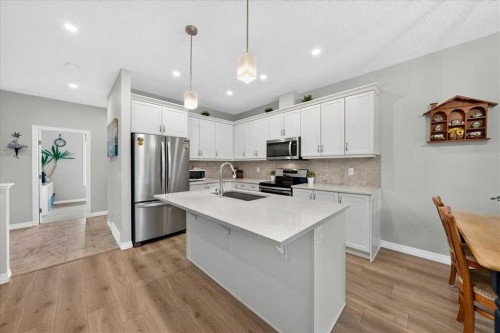 62 Evanscrest Road Nw, Calgary, AB - Indoor Photo Showing Kitchen With Upgraded Kitchen