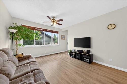 62 Evanscrest Road Nw, Calgary, AB - Indoor Photo Showing Living Room