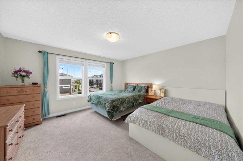 62 Evanscrest Road Nw, Calgary, AB - Indoor Photo Showing Bedroom