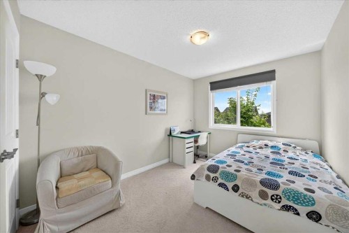 62 Evanscrest Road Nw, Calgary, AB - Indoor Photo Showing Bedroom
