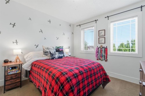 245 Cimarron Vista Way, Okotoks, AB - Indoor Photo Showing Bedroom