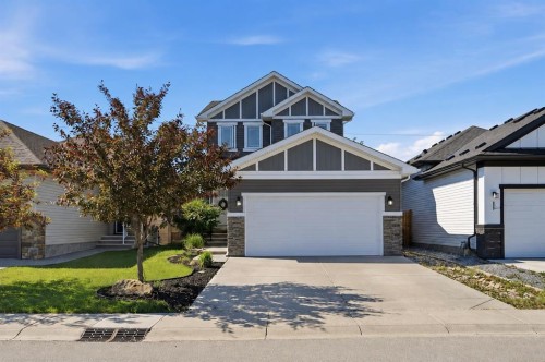 245 Cimarron Vista Way, Okotoks, AB - Outdoor With Facade