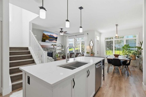 245 Cimarron Vista Way, Okotoks, AB - Indoor Photo Showing Kitchen With Double Sink
