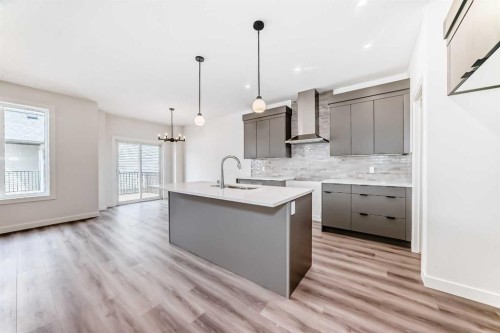 109 Heritage Park, Cochrane, AB - Indoor Photo Showing Kitchen With Upgraded Kitchen