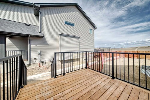 109 Heritage Park, Cochrane, AB - Outdoor With Deck Patio Veranda With Exterior