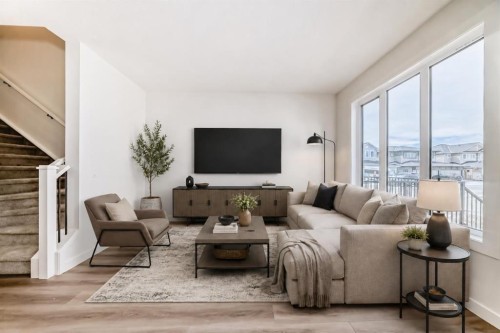 109 Heritage Park, Cochrane, AB - Indoor Photo Showing Living Room