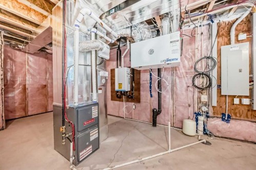 109 Heritage Park, Cochrane, AB - Indoor Photo Showing Basement