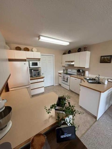 302-105 7 Avenue Se, High River, AB 