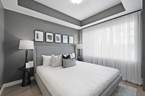 3314-6 Merganser Drive West, Chestermere, AB - Indoor Photo Showing Bedroom