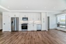 201-110 18A Street Nw, Calgary, AB  - Indoor Photo Showing Kitchen With Stainless Steel Kitchen 
