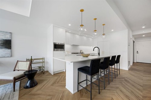114-8505 Broadcast Avenue Sw, Calgary, AB - Indoor Photo Showing Kitchen With Upgraded Kitchen