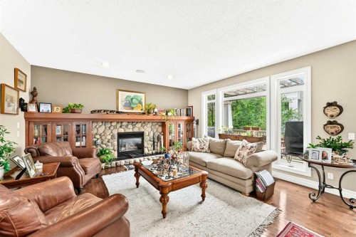 1748 Hidden Creek Way Nw, Calgary, AB - Indoor Photo Showing Living Room With Fireplace