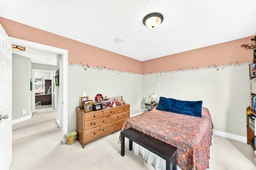 1748 Hidden Creek Way Nw, Calgary, AB - Indoor Photo Showing Bedroom