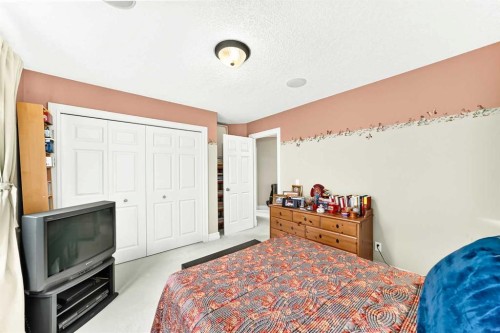 1748 Hidden Creek Way Nw, Calgary, AB - Indoor Photo Showing Bedroom