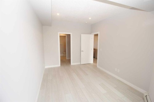 214-8370 Broadcast Avenue Sw, Calgary, AB - Indoor Photo Showing Other Room