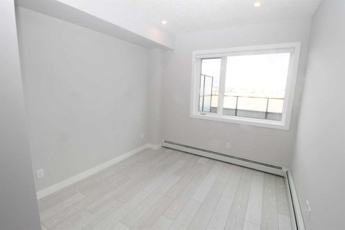 214-8370 Broadcast Avenue Sw, Calgary, AB - Indoor Photo Showing Other Room
