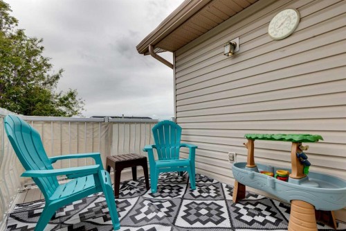 4 Big Springs Hill Se, Airdrie, AB - Outdoor With Deck Patio Veranda With Exterior