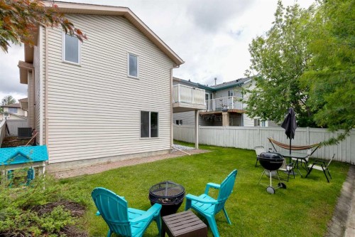4 Big Springs Hill Se, Airdrie, AB - Outdoor With Deck Patio Veranda