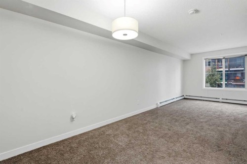 215-7110 80 Avenue Ne, Calgary, AB - Indoor Photo Showing Other Room