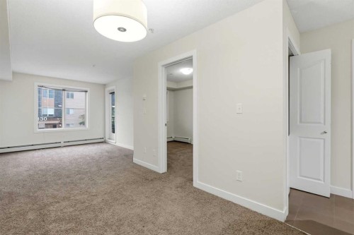 215-7110 80 Avenue Ne, Calgary, AB - Indoor Photo Showing Other Room