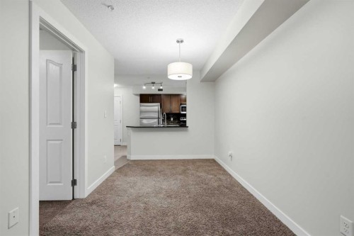 215-7110 80 Avenue Ne, Calgary, AB - Indoor Photo Showing Other Room