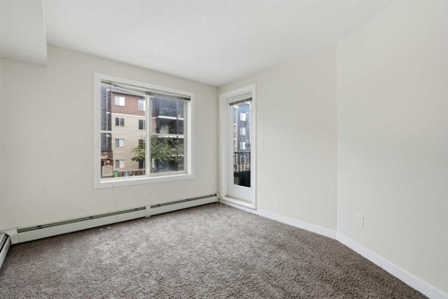 215-7110 80 Avenue Ne, Calgary, AB - Indoor Photo Showing Other Room