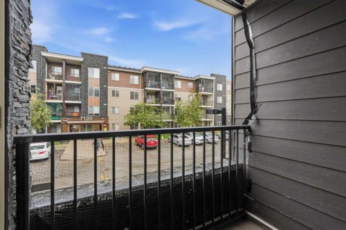 215-7110 80 Avenue Ne, Calgary, AB - Outdoor With Balcony With Exterior