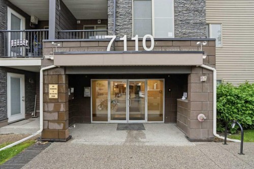 215-7110 80 Avenue Ne, Calgary, AB - Outdoor With Balcony With Exterior