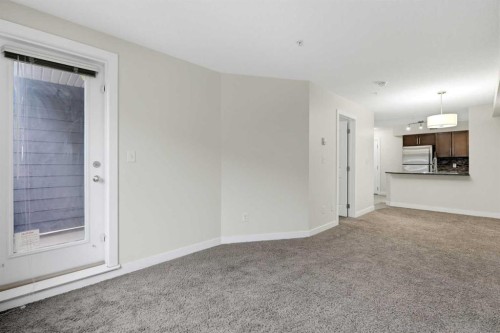 215-7110 80 Avenue Ne, Calgary, AB - Indoor Photo Showing Other Room