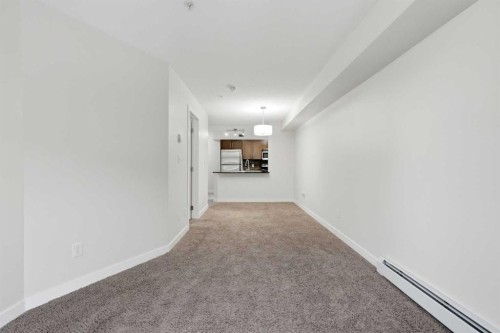 215-7110 80 Avenue Ne, Calgary, AB - Indoor Photo Showing Other Room