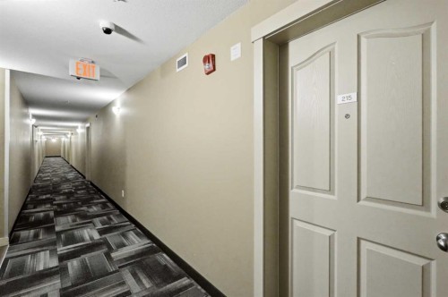 215-7110 80 Avenue Ne, Calgary, AB - Indoor Photo Showing Other Room